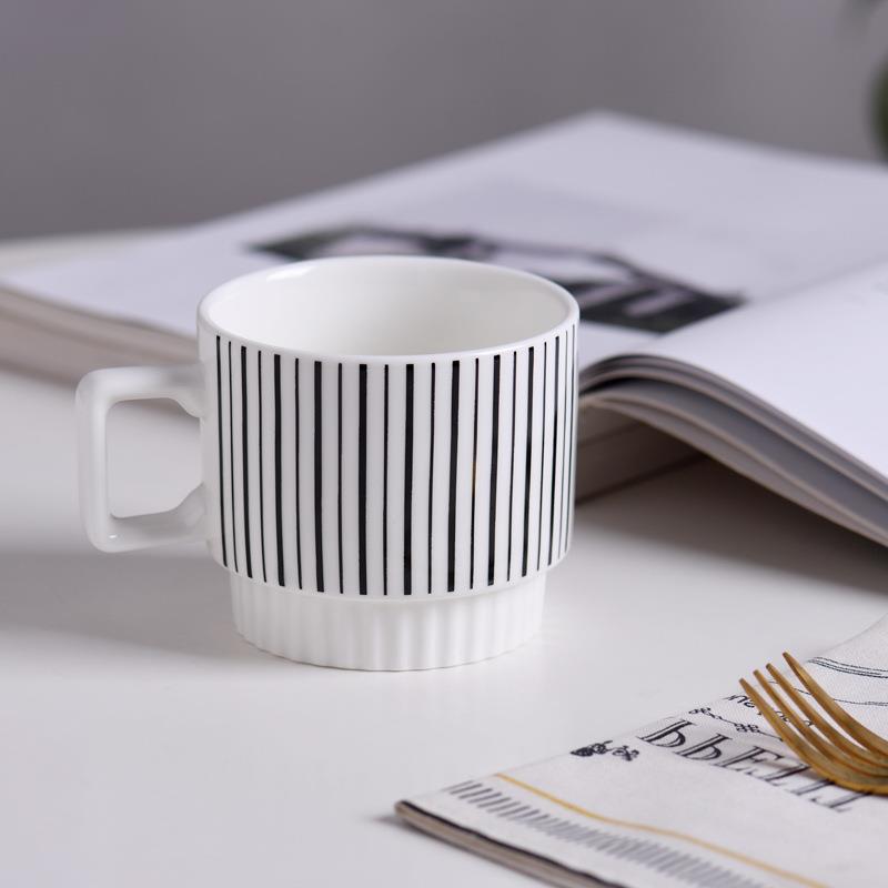 BLACK & WHITE CERAMIC STACKING CUPS