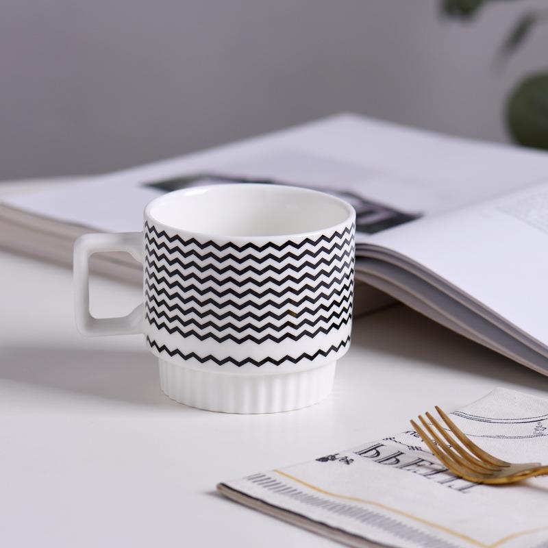 BLACK & WHITE CERAMIC STACKING CUPS